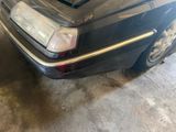 a picture of a car parked in a garage