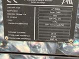 a sign on the side of a machine that says aptechiasas