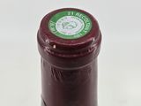 a bottle of wine that is sitting on a table