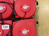 four red blowers sitting on top of a floor next to each other