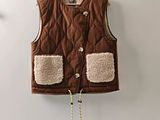 the vest is brown and has two pockets on the front