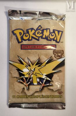 a close up of a bag of pokemon trading cards on a table