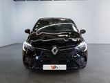 the front view of a black car in a showroom