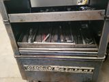 a metal tool box with a bunch of tools in it