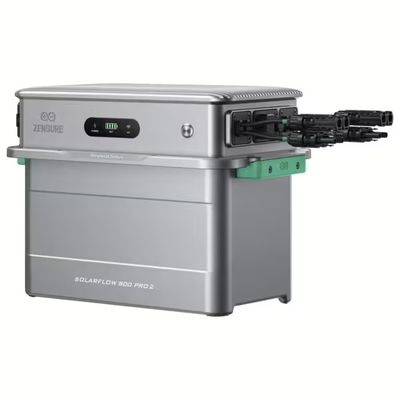 a close up of a silver and black machine on a white background