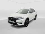 a white car in a white room with a white background