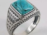 bague en argent massif sertie d'une pierre de turquoise