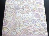 a close up of a box with a pattern on it