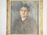 an old painting of a woman in a black dress is on a wooden easel
