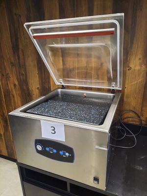 a close up of a machine that is sitting on top of a table