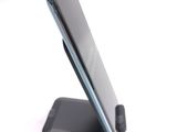 a close up of a cell phone on a stand