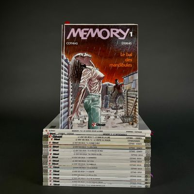 books stacked on top of each other on a black surface
