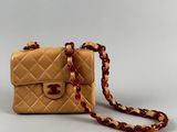 chanel beige quilted lambskin mini flap bag