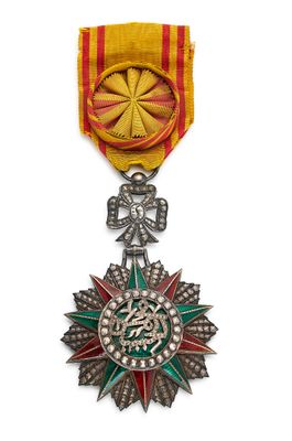 l'image d'une médaille surmontée d'une étoile