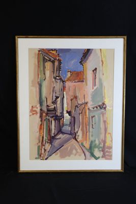framed watercolor painting of a narrow street in a small town