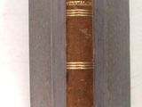 a book that is open on a white surface