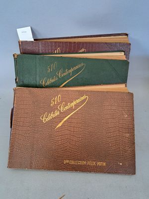 three books are stacked on top of each other on a table