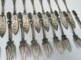 a lot of spoons that are sitting on a table