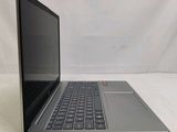 an open laptop computer sitting on top of a white surface