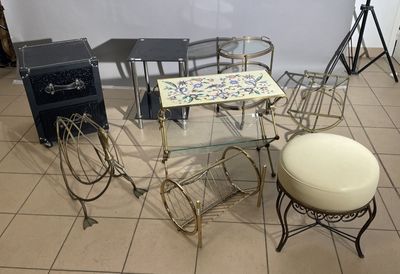 a glass table with a stool and a stool on it