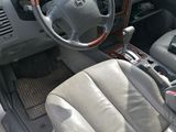 a car with a steering wheel and a dash board