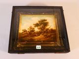 une vieille photo représentant une peinture sur une boîte en bois sur laquelle est collé un autocollant