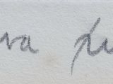 a close up of a piece of paper with writing on it