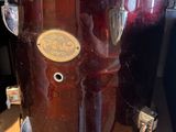 a close up of a drum on a stand in a room