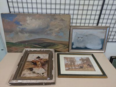 three paintings on a table with a cat on it