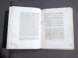 an open book that is sitting on a table