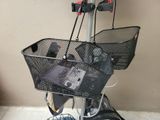 a bike with a basket attached to the back of it