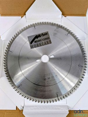 a circular saw blade in a box on a table