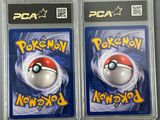 two packs of pokemon cards in plastic cases on a table