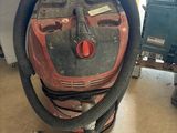 an image of a vacuum cleaner sitting on top of a floor