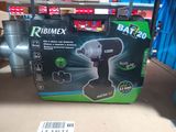 a box with a drill in it sitting on a table