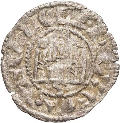 a silver coin with an image of a ship on it