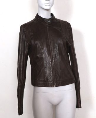 the mannequin is wearing a brown leather jacket on a white mannequin
