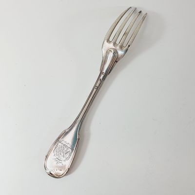 a fork that is sitting on a table