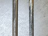 a knife and a knife blade on a table