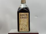 a bottle of rum sitting on top of a clear box