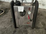 a machine that is sitting in a garage