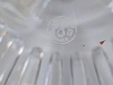 a clear glass plate with a hole in the middle