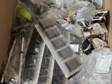 a cardboard box filled with many different types of electronic devices