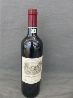 a bottle of wine that is sitting on a table