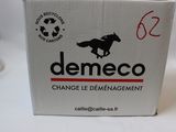 a box with a horse on it sitting on a table