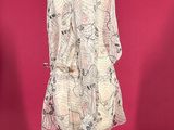 an image of a dress on a mannequin stand