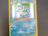 a close up of a pokemon card on a table