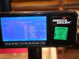 a close up of a digital scale with a clock on it
