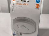 the smoke alarm is in the box on the table