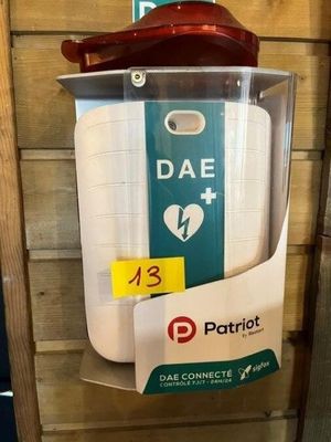 a plastic container with a heart rate monitor attached to it
